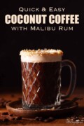 Labelled Malibu coconut coffee with cream float in a glass rimmed with toasted coconut.