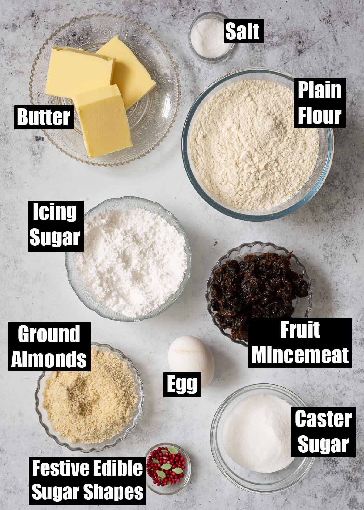 Labelled ingredients for mince pies with frangipane topping.
