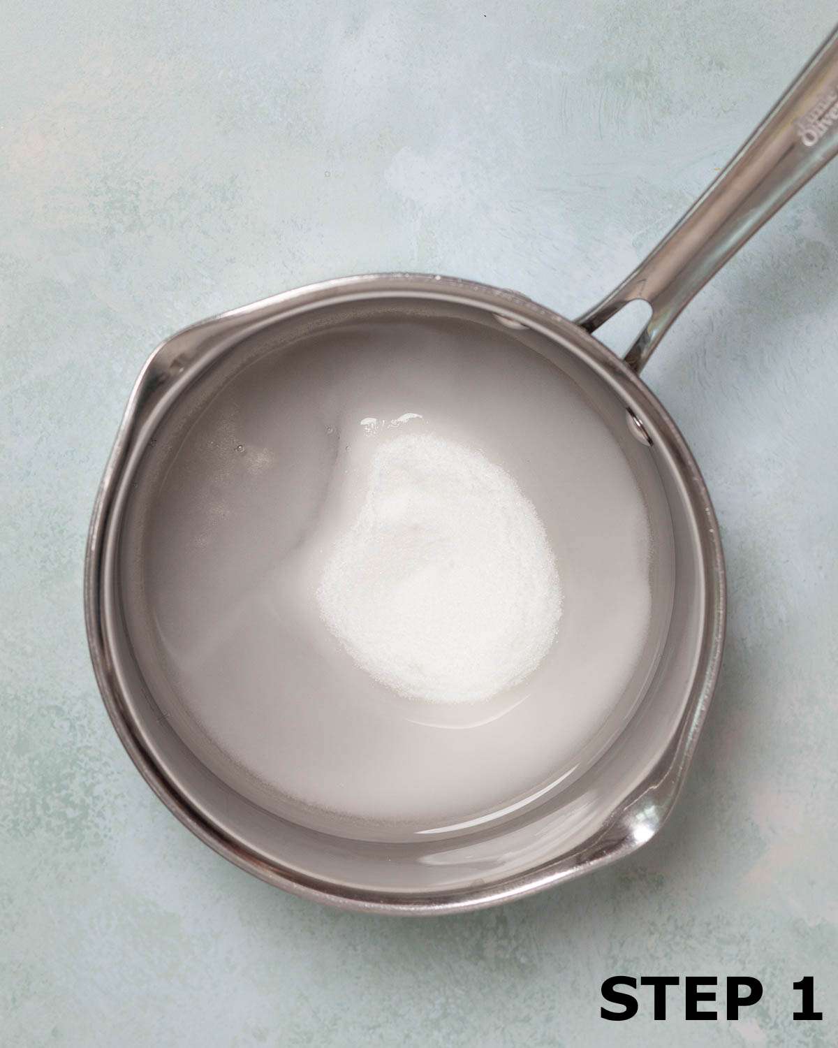 Sugar and water in a small saucepan.