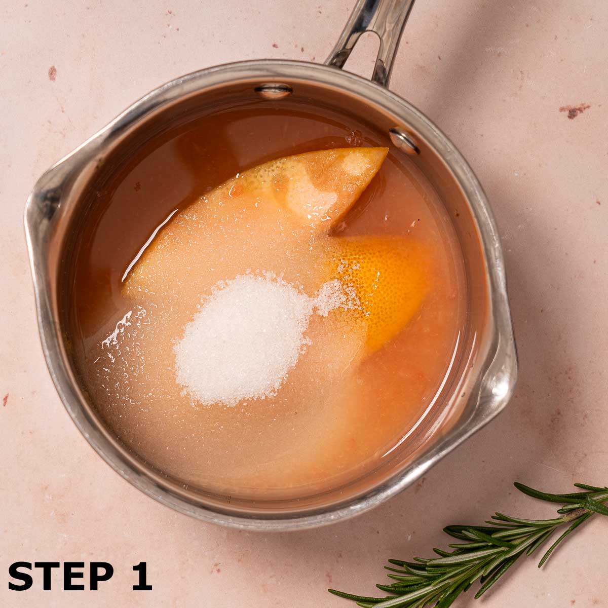 Sugar, grapefruit juice and grapefruit zest in a saucepman.