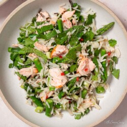 Salmon bowl with wild rice, asparagus, mint, coriander and chilli.