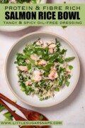 Salmon rice bowl with asparagus, mint and coriander with text overlay.