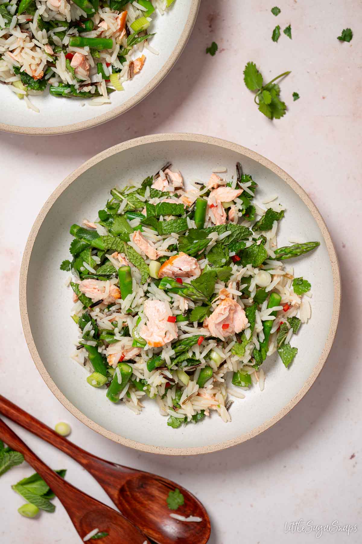 Rice bowl with salmon, asparagus, mint, coriander and chilli.