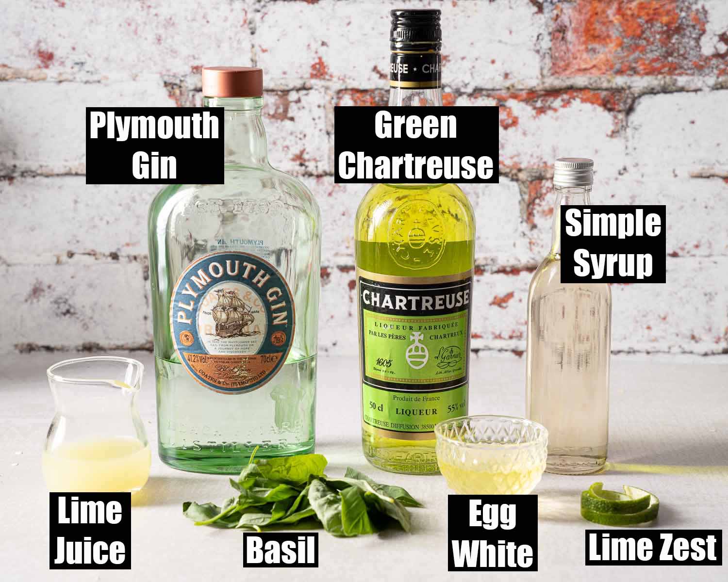 Labelled ingredients for a gin and basil cocktail.