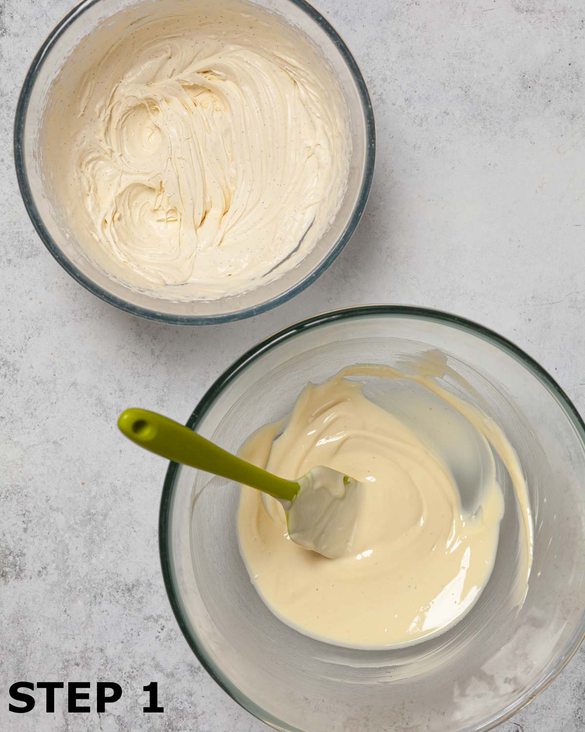 Bowls of whipped cream and melted white chocolate.