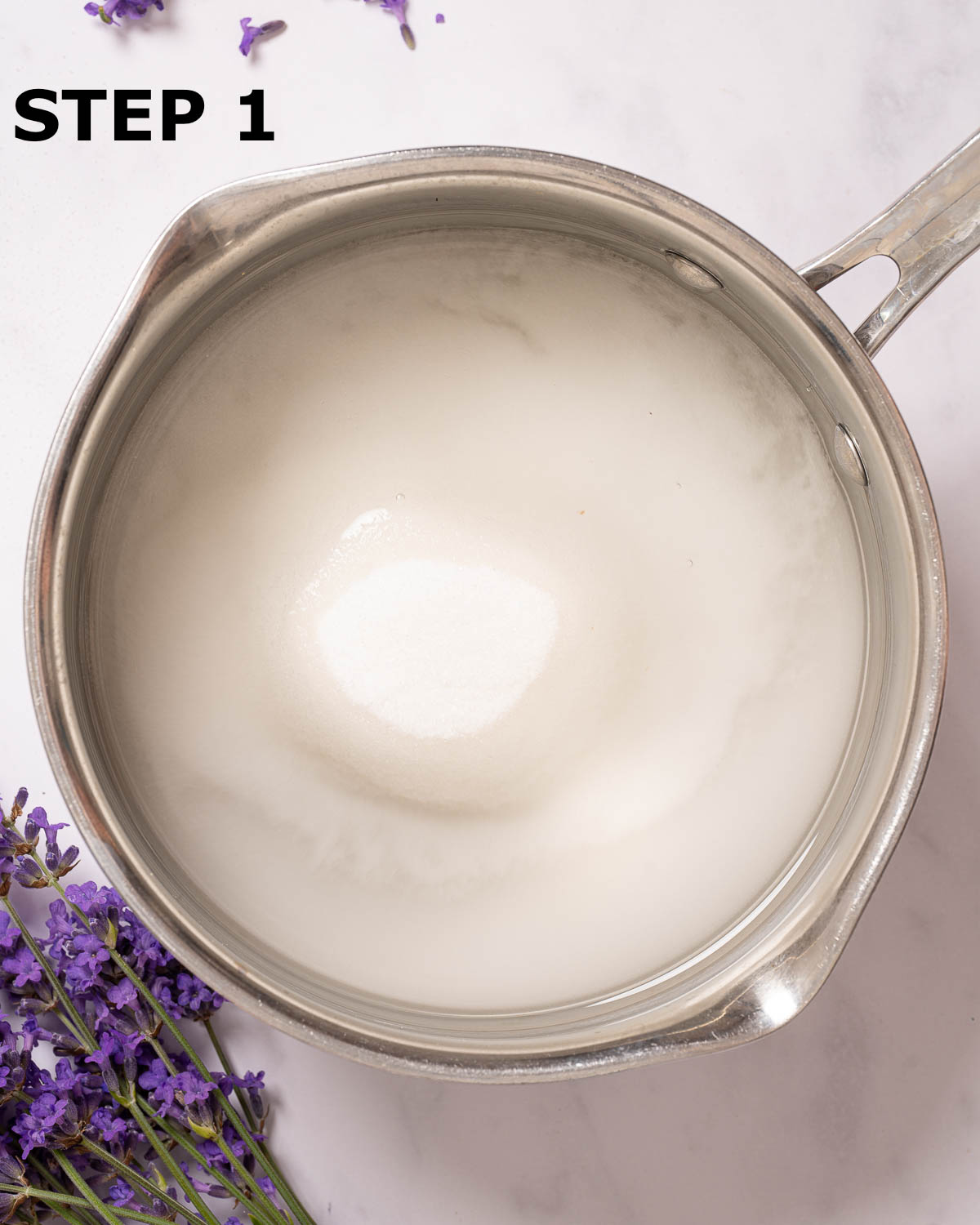 Sugar and water in a saucepan.