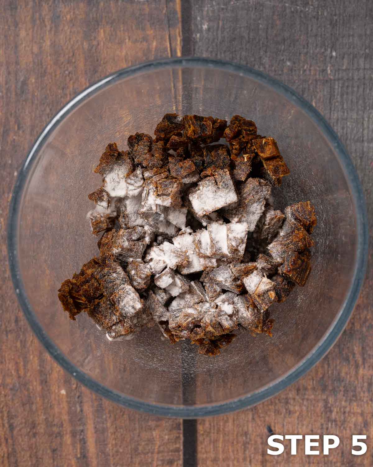 Chopped block dates and bicarbonate of soda in a bowl.