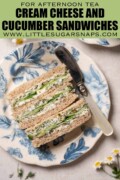Cucumber finger sandwiches on a plate with a knife beside them with text overlay.