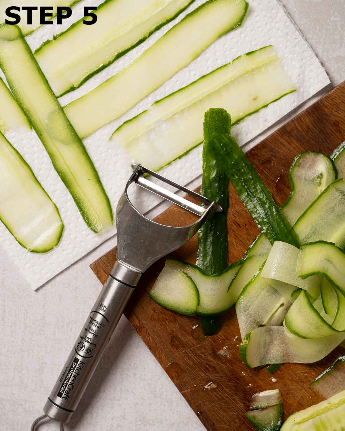 Cucumber cut into ribbons using a y-shaped cutter.